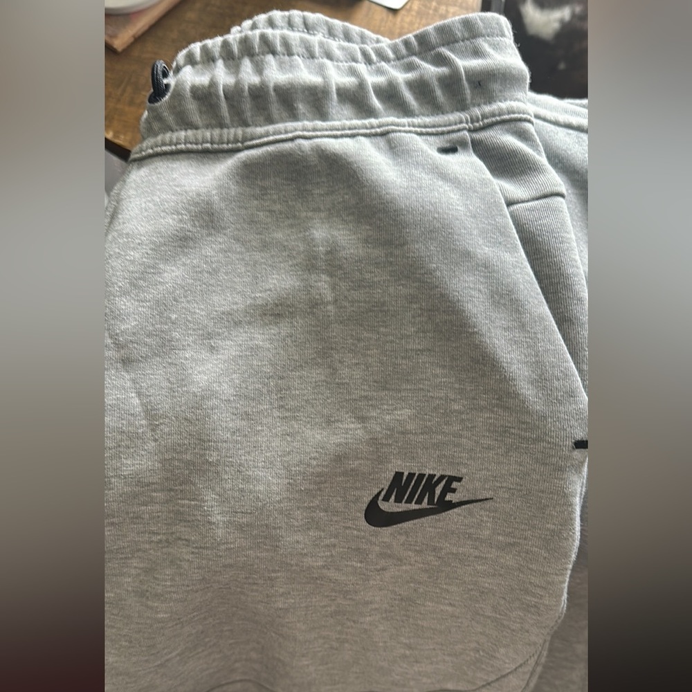 Size Large Boys Nike TECH gray matching set.